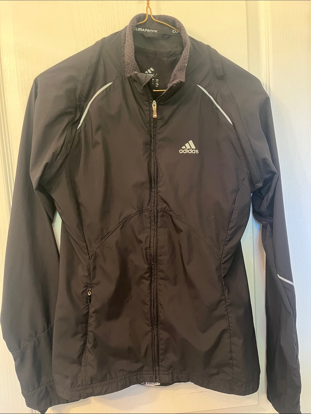 adidas Black Women's Climaproof Windbreaker Zip Jacket with Reflective Piping